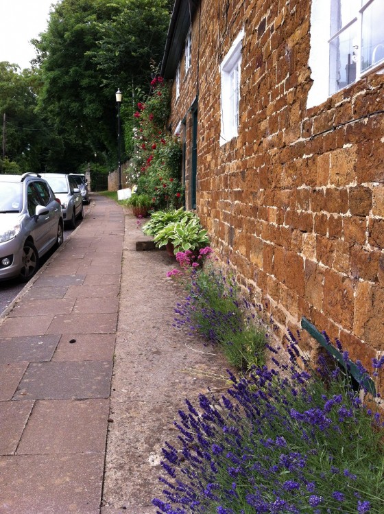 the warmth and comfort of a long brick wall...