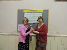 Caroline hands over the gavel to Diane