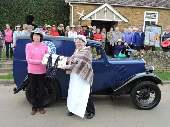 The Centenary Baton handover outside the Village hall.